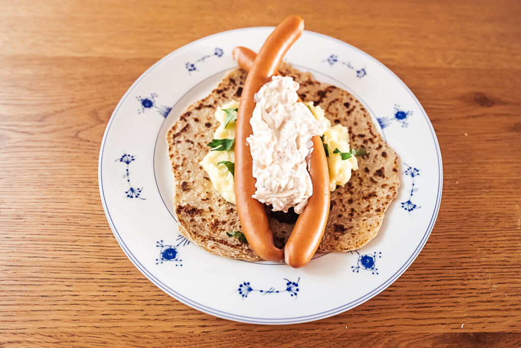 Swedish hotdogs on lomper with marsh potatoes and Skagenröra