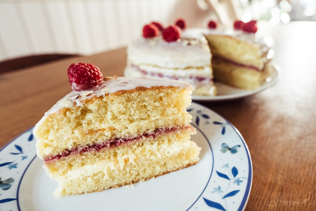 danish layer cake slice with vanilla cream and jam