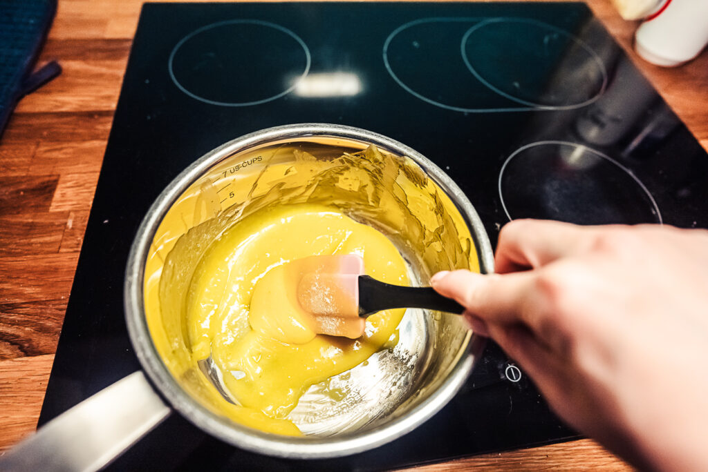 making yellow egg cream frosting