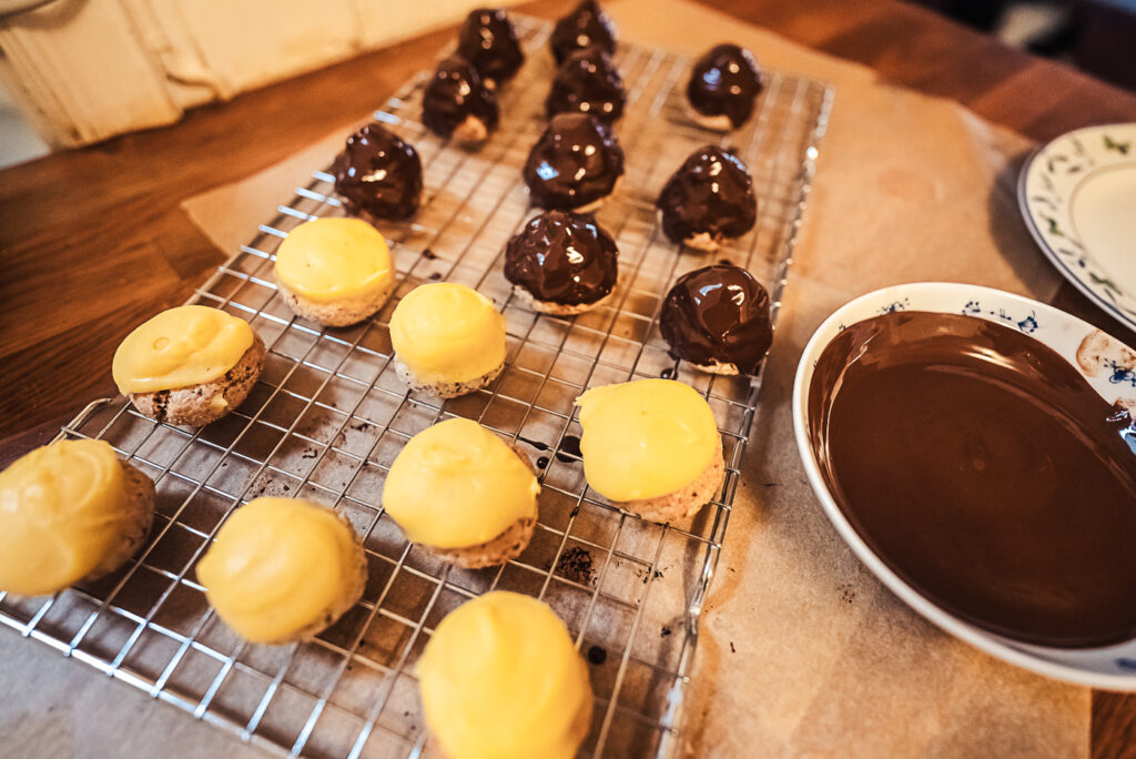 dipping sarah bernhardt cookies in chocolate