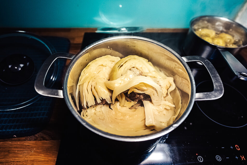 cooking fårikål in a pot