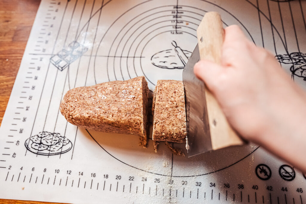 slicing kransekake dough