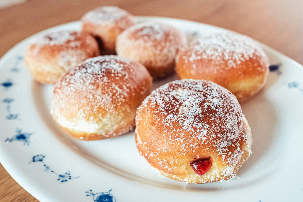 Norwegian solboller (berliner) doughnuts filled with raspberry jam