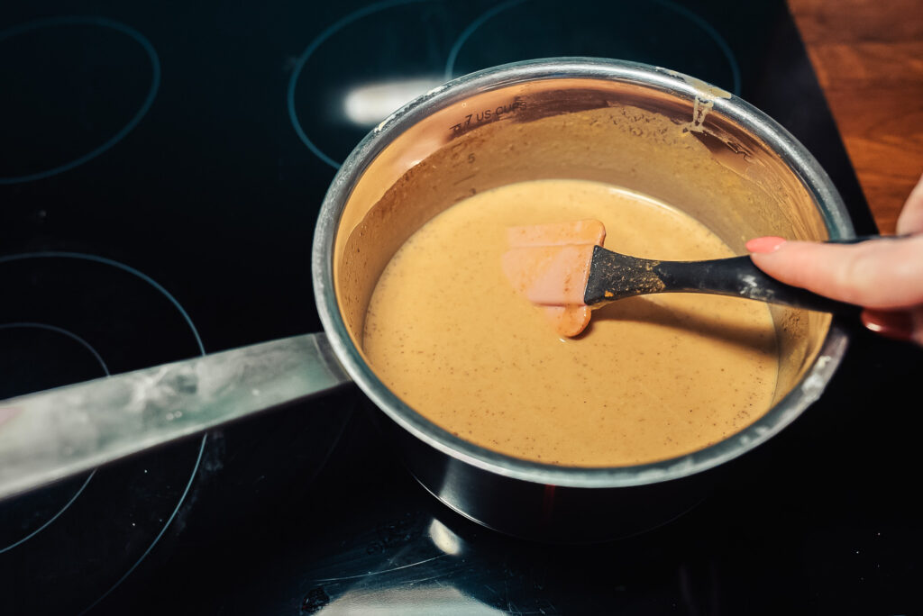 making pumpkin custard in a saucepan 