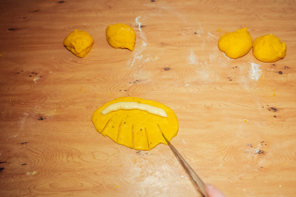 forming Swedish saffron buns