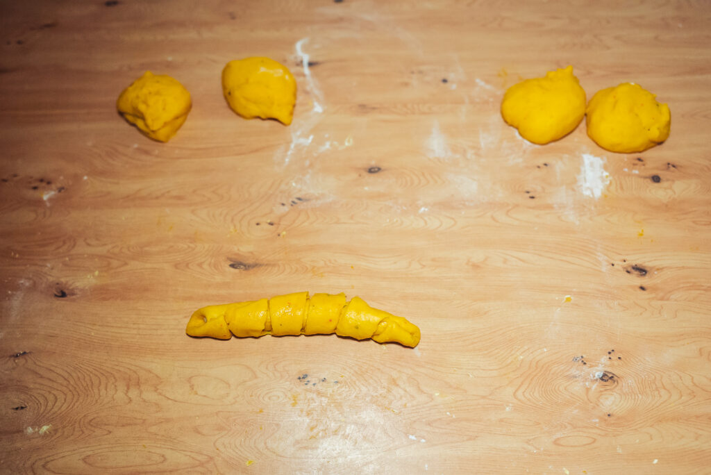 forming Swedish saffron buns