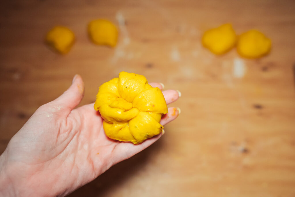 forming Swedish saffron buns