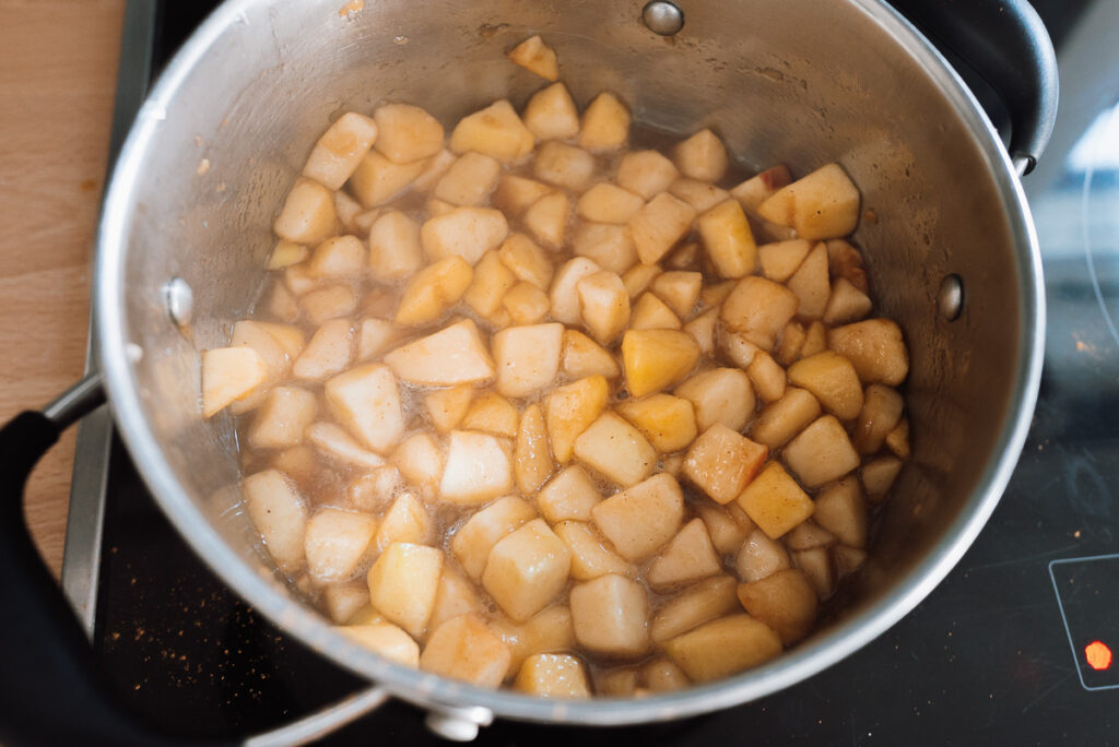 cooking apple filling in a saucepan